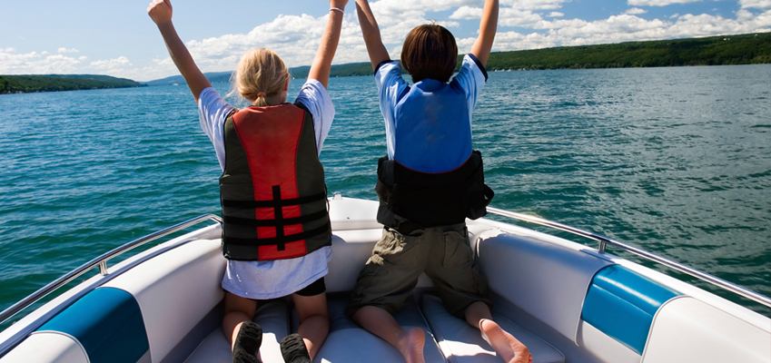 Kids Enjoying the Lake on a Boat
